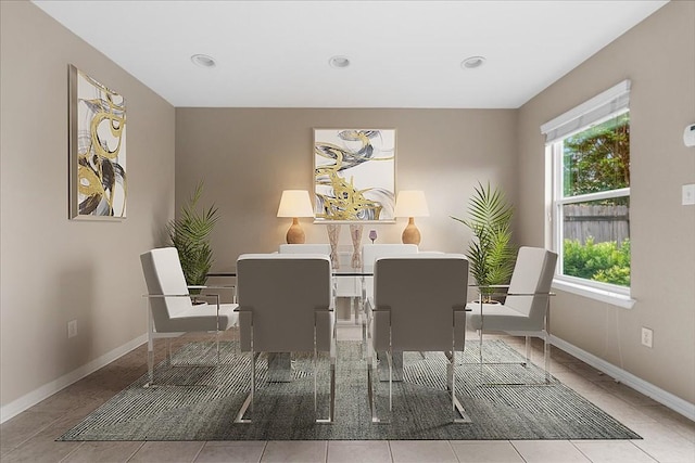 163 Wainscot Oak Way, San Marcos, TX 78666 - tiled dining room with baseboards and recessed lighting