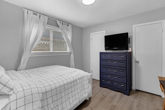 609 Blackberry Dr, Austin, TX 78745 - bedroom featuring light wood-style floors