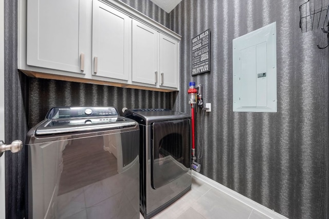 121 Cartwheel Bnd Unit 42, Austin, TX 78738 - laundry room featuring cabinet space, electric panel, and independent washer and dryer