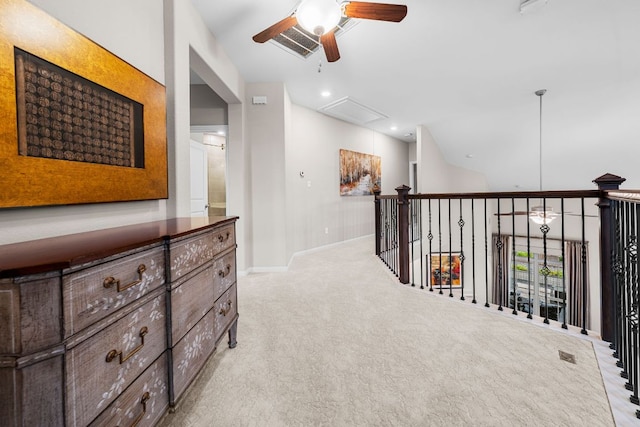 121 Cartwheel Bnd Unit 42, Austin, TX 78738 - hallway featuring attic access, carpet, and recessed lighting