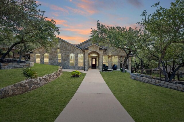 820 Morgan Hill Dr, Dripping Springs, TX 78620 - french country home with stone siding and a yard