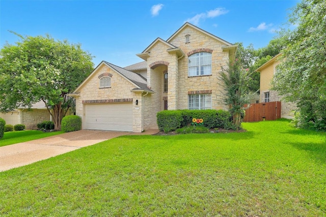 2021 Kimbrook Dr, Round Rock, TX 78681 - french country home with stone siding, a garage, and driveway
