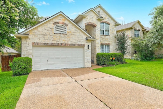 2021 Kimbrook Dr, Round Rock, TX 78681 - french country inspired facade with stone siding, driveway, and a garage