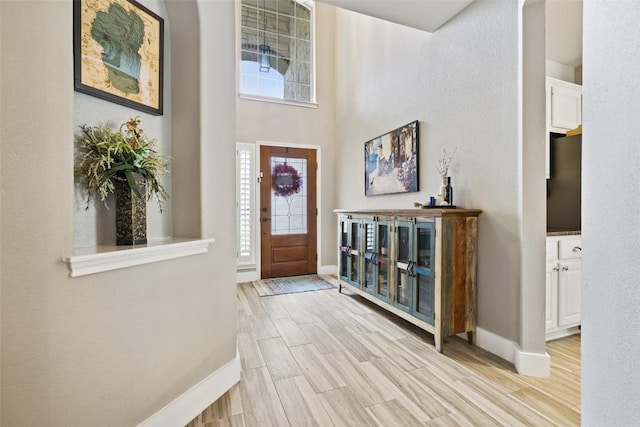 2021 Kimbrook Dr, Round Rock, TX 78681 - entrance foyer with baseboards and light wood-type flooring