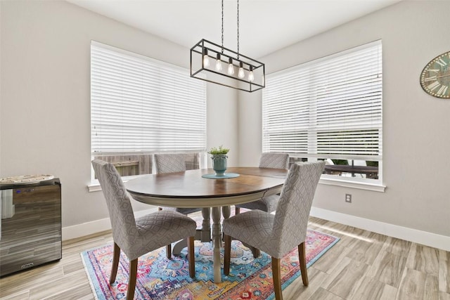 2021 Kimbrook Dr, Round Rock, TX 78681 - dining space with baseboards, a chandelier, and light wood-style floors