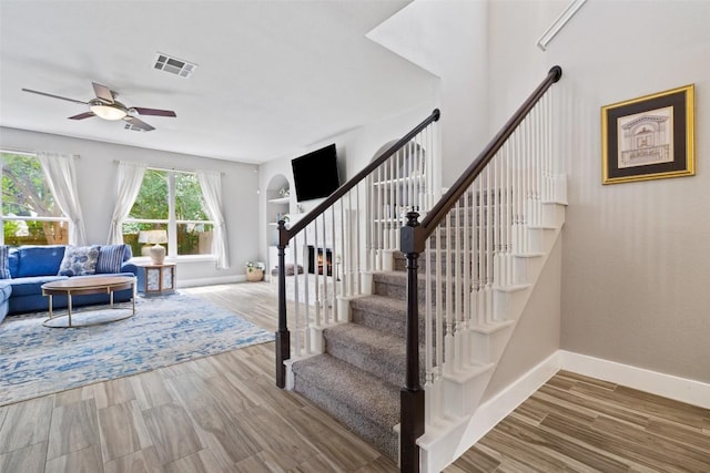 2021 Kimbrook Dr, Round Rock, TX 78681 - stairway with ceiling fan and wood finished floors