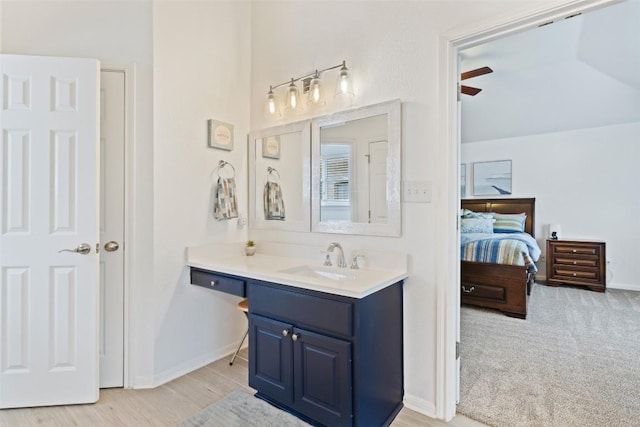 2021 Kimbrook Dr, Round Rock, TX 78681 - ensuite bathroom featuring vanity, baseboards, and a ceiling fan