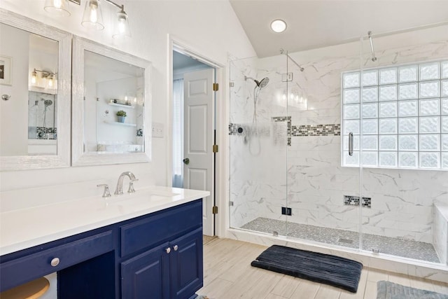 2021 Kimbrook Dr, Round Rock, TX 78681 - bathroom with a marble finish shower, vanity, and vaulted ceiling