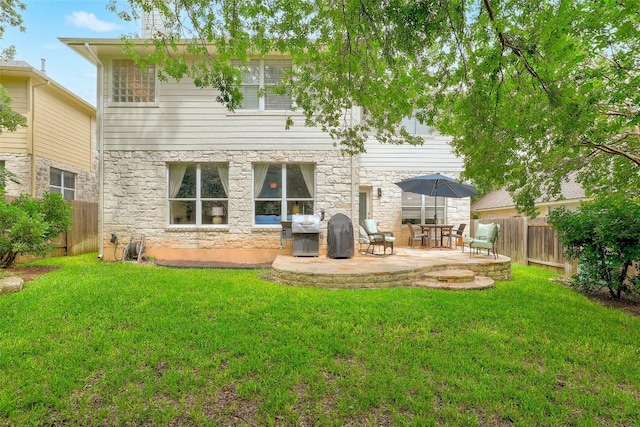 2021 Kimbrook Dr, Round Rock, TX 78681 - back of house with a patio and stone siding