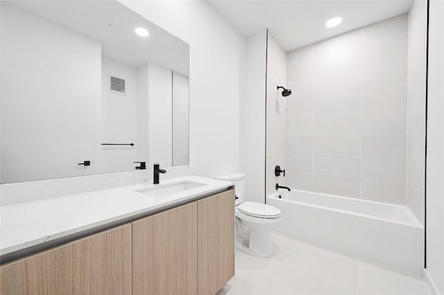 2209 S 1st St Unit 309, Austin, TX 78704 - full bath featuring vanity, toilet,  shower combination, recessed lighting, and tile patterned flooring