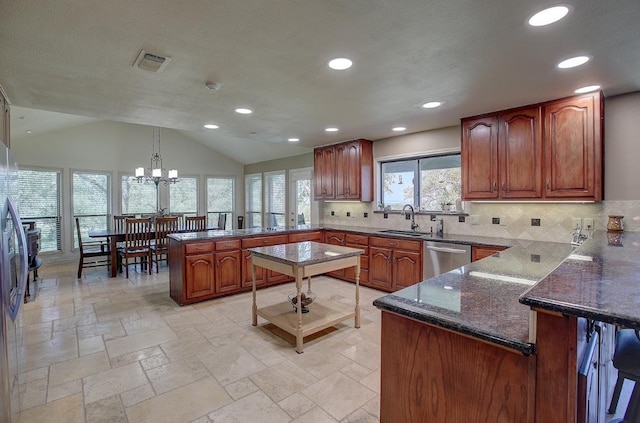 3514 Fm 3509, Burnet, TX 78611 - kitchen featuring a peninsula, stainless steel dishwasher, tasteful backsplash, dark stone counters, and a sink