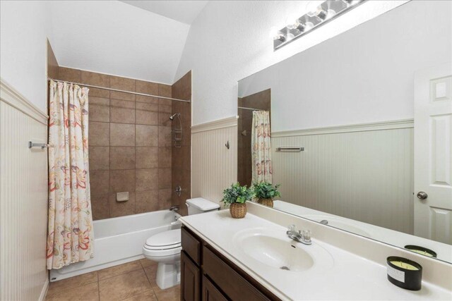 2709 Sun Mountain Dr, Leander, TX 78641 - full bath with vanity, shower / bath combination with curtain, wainscoting, and tile patterned flooring