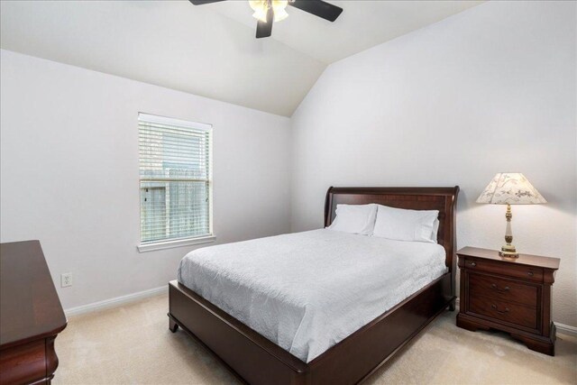 2709 Sun Mountain Dr, Leander, TX 78641 - bedroom featuring light carpet, lofted ceiling, and ceiling fan
