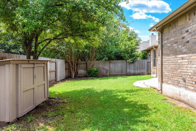 2709 Sun Mountain Dr, Leander, TX 78641 - fenced backyard featuring a storage shed