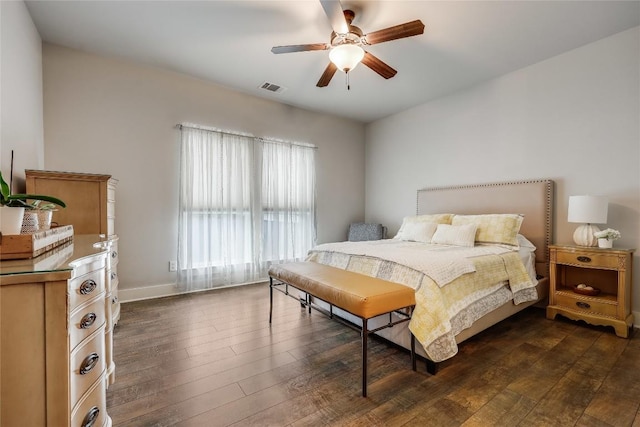 21800 Owens Cv, Lago Vista, TX 78645 - bedroom with dark wood-type flooring and ceiling fan