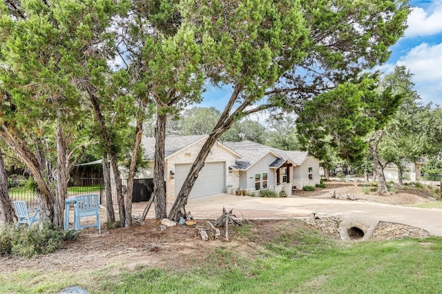21800 Owens Cv, Lago Vista, TX 78645 - ranch-style home featuring driveway and an attached garage
