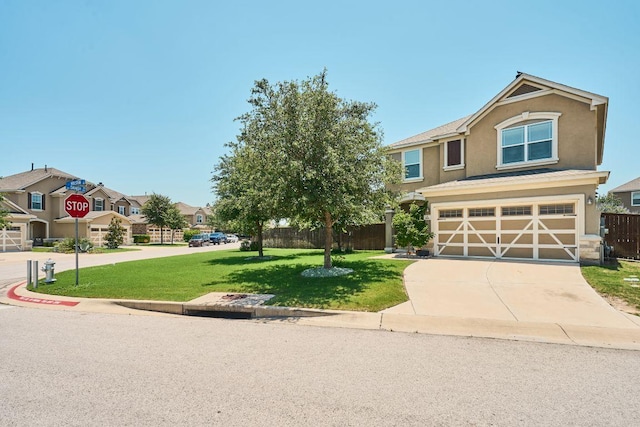 144 Holstein St, Hutto, TX 78634 - traditional-style home with stucco siding, driveway, an attached garage, and a residential view