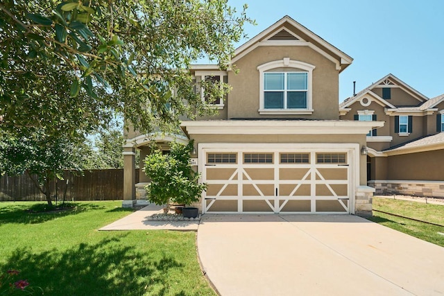 144 Holstein St, Hutto, TX 78634 - view of front of home with stucco siding, concrete driveway, and an attached garage