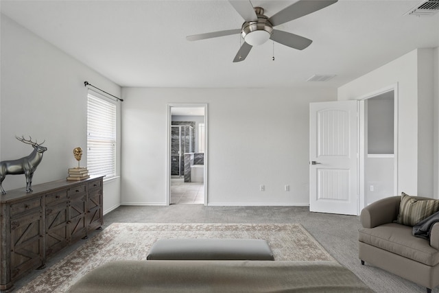 144 Holstein St, Hutto, TX 78634 - carpeted living room featuring a ceiling fan and baseboards