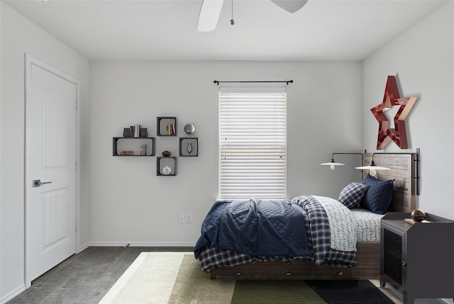 144 Holstein St, Hutto, TX 78634 - carpeted bedroom featuring baseboards and a ceiling fan
