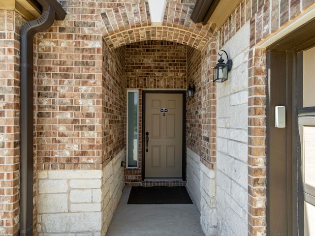 18401 Pencil Cactus Dr, Pflugerville, TX 78660 - doorway to property with brick siding