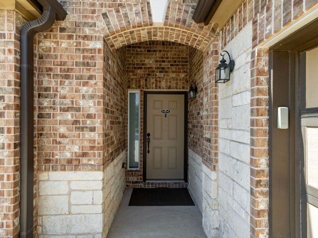18401 Pencil Cactus Dr, Pflugerville, TX 78660 - property entrance featuring brick siding