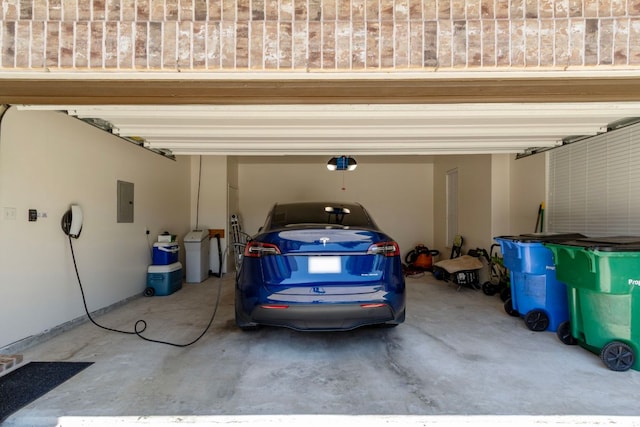 18401 Pencil Cactus Dr, Pflugerville, TX 78660 - garage featuring a garage door opener and electric panel