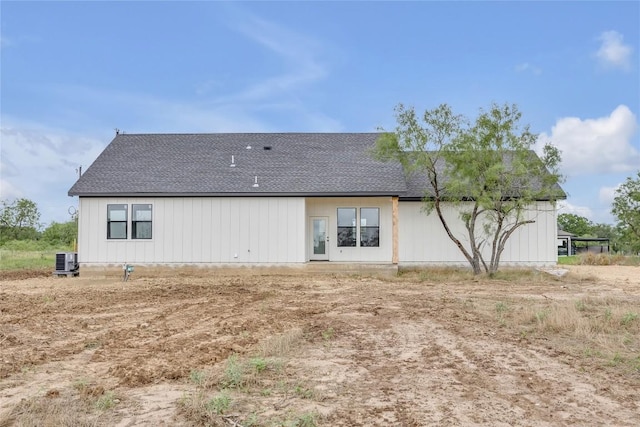 138 Blushing Dr, Cedar Creek, TX 78612 - rear view of house with roof with shingles and central AC