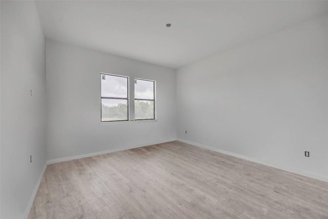 138 Blushing Dr, Cedar Creek, TX 78612 - spare room featuring light wood finished floors and baseboards