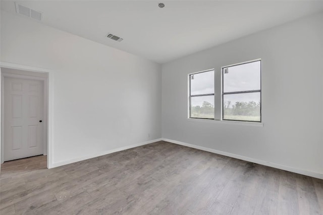 138 Blushing Dr, Cedar Creek, TX 78612 - unfurnished room featuring wood finished floors and baseboards