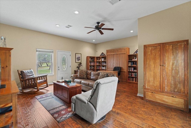721 Deer Run, Wimberley, TX 78676 - living room with dark wood finished floors, a ceiling fan, and recessed lighting