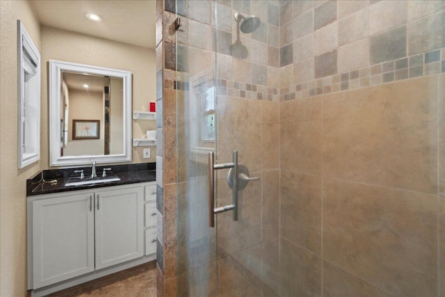 721 Deer Run, Wimberley, TX 78676 - full bath with a shower stall, vanity, and recessed lighting