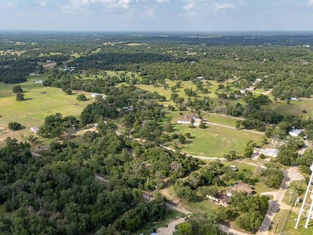 570 Oak Park Five St, Rockdale, TX 76567 - aerial overview of property's location featuring a heavily wooded area