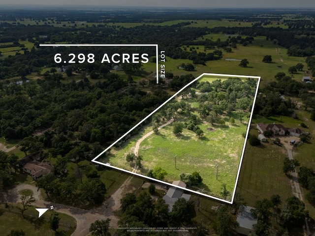 570 Oak Park Five St, Rockdale, TX 76567 - aerial view of property's location with property boundaries highlighted and rural landscape