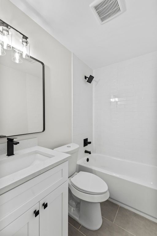 210 Las Colinas Dr, Georgetown, TX 78628 - full bath featuring toilet, vanity, tile patterned flooring, and shower / bathtub combination