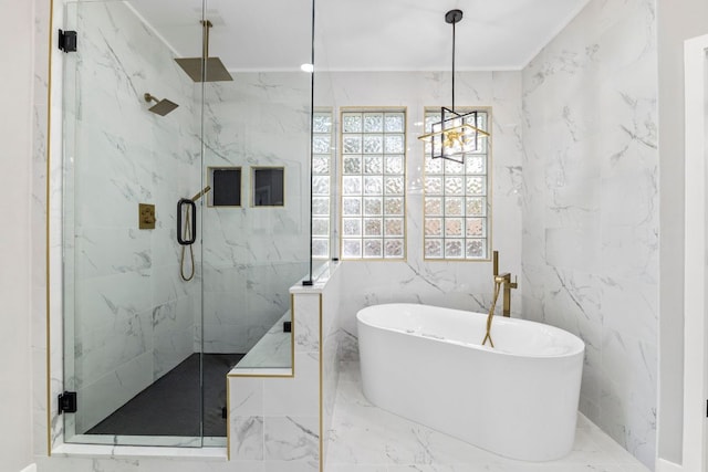 210 Las Colinas Dr, Georgetown, TX 78628 - bathroom featuring tile walls, a marble finish shower, a soaking tub, marble tiled flooring, and a chandelier
