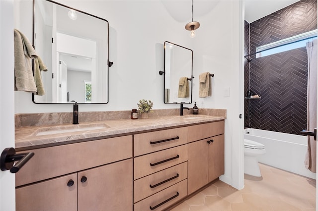 120 July Johnson Dr, Austin, TX 78737 - full bathroom featuring double vanity, toilet, shower / tub combination, and healthy amount of natural light