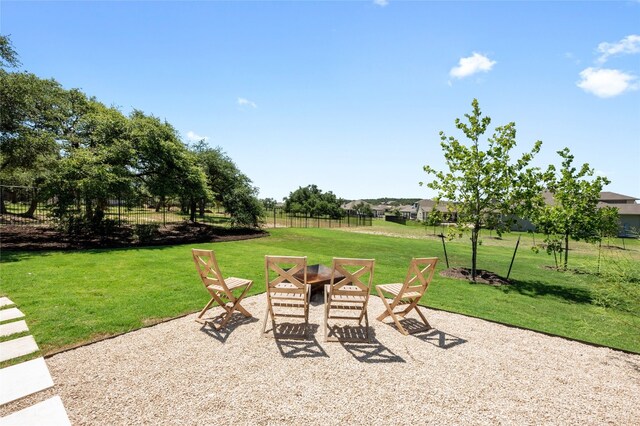 120 July Johnson Dr, Austin, TX 78737 - view of patio / terrace with an outdoor fire pit