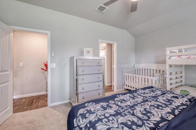 19413 Abigail Fillmore Rd, Manor, TX 78653 - carpeted bedroom with vaulted ceiling, baseboards, and ceiling fan
