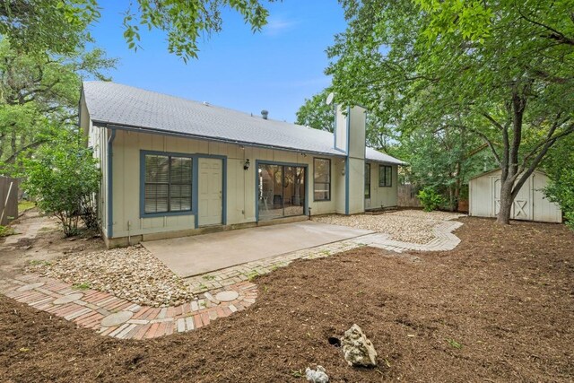 1706 Prairie Hen Cv, Austin, TX 78758 - back of house with a patio and roof with shingles