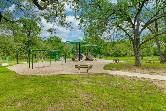 1706 Prairie Hen Cv, Austin, TX 78758 - community play area featuring a lawn