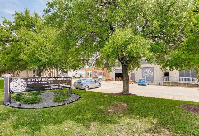 1706 Prairie Hen Cv, Austin, TX 78758 - community sign with a lawn