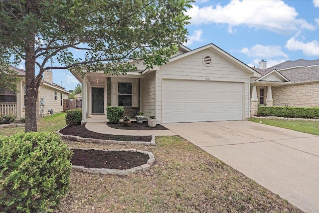 8520 Chick Pea Ln, Austin, TX 78748 - view of front facade with a garage and driveway