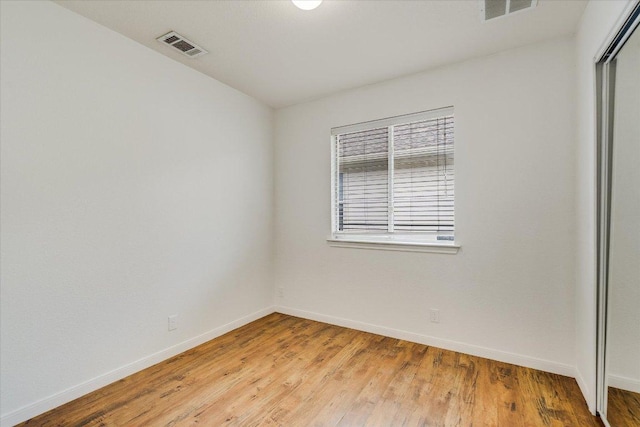 8520 Chick Pea Ln, Austin, TX 78748 - unfurnished room with baseboards and light wood finished floors