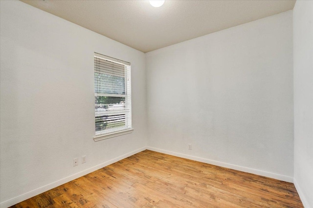8520 Chick Pea Ln, Austin, TX 78748 - spare room with baseboards and light wood-style floors