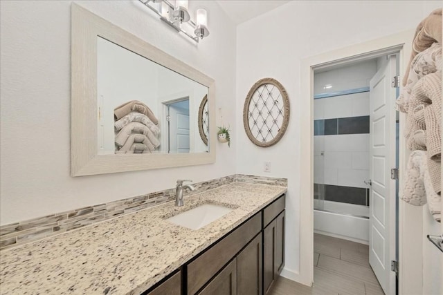 19506 Inverness Dr, Lakeway, TX 78669 - bathroom with vanity and shower / washtub combination