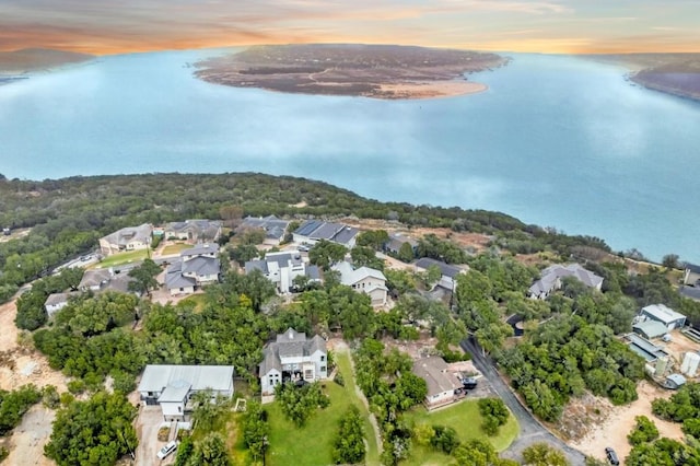 19506 Inverness Dr, Lakeway, TX 78669 - aerial view at dusk of a water view and a residential view