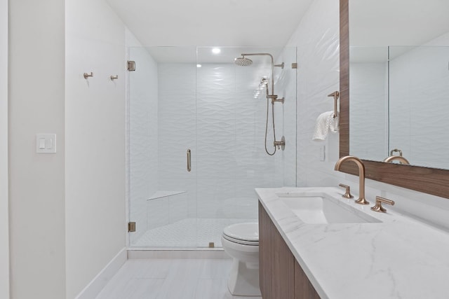 360 Nueces St Unit 1811, Austin, TX 78701 - full bath featuring vanity, toilet, a stall shower, and recessed lighting