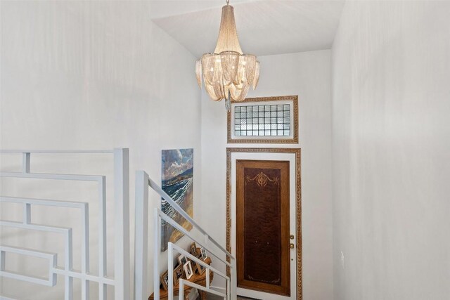 2449 Crosswind Dr, Lakeway, TX 78669 - entrance foyer featuring a chandelier
