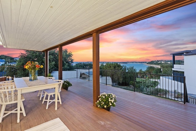 2449 Crosswind Dr, Lakeway, TX 78669 - deck at dusk with outdoor dining space